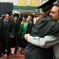 adams state graduates in plachy field house